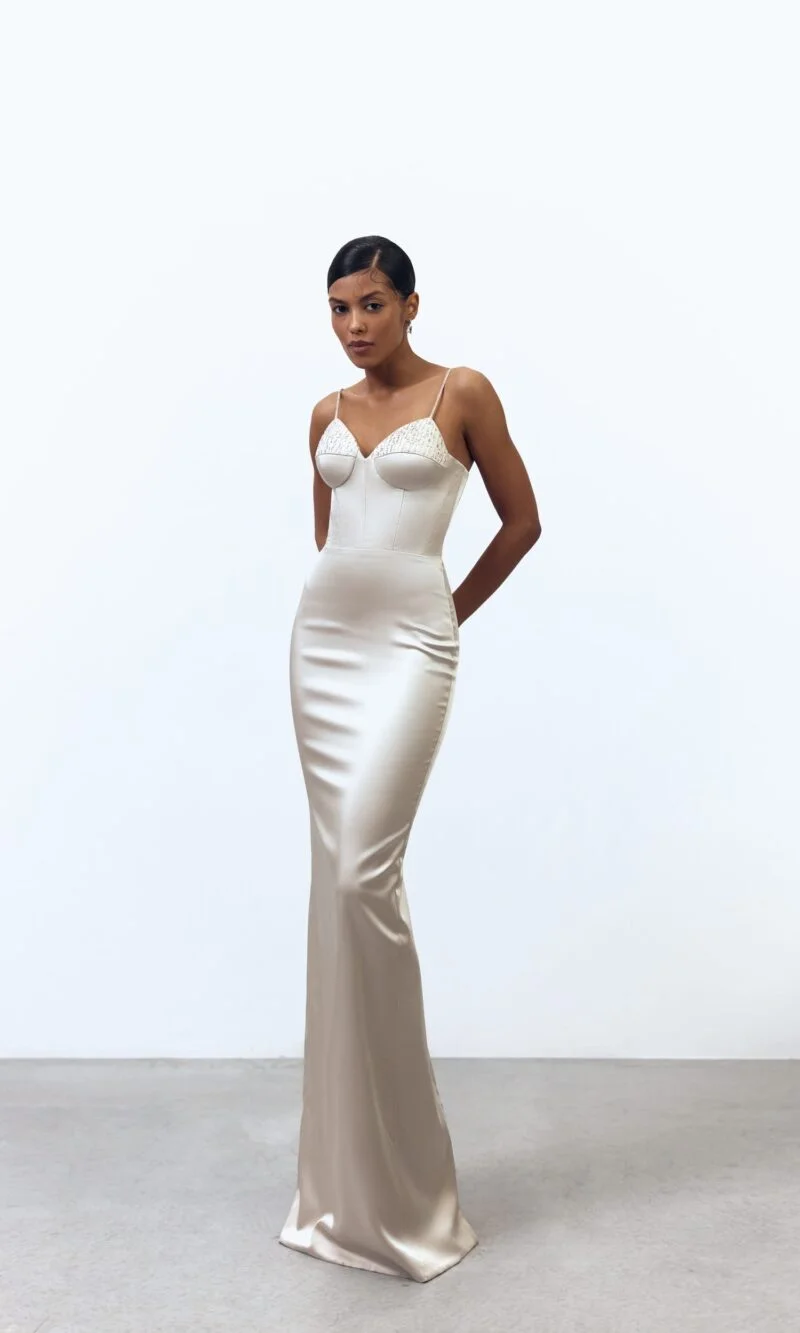 Chic fit-and-flare dress in glossy satin with a sweetheart neckline, crystal-adorned corset